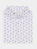 Folded white shirt with a spread collar, featuring a blue dodo pattern. It has a label, three buttons, and conveys a crisp, elegant appearance.