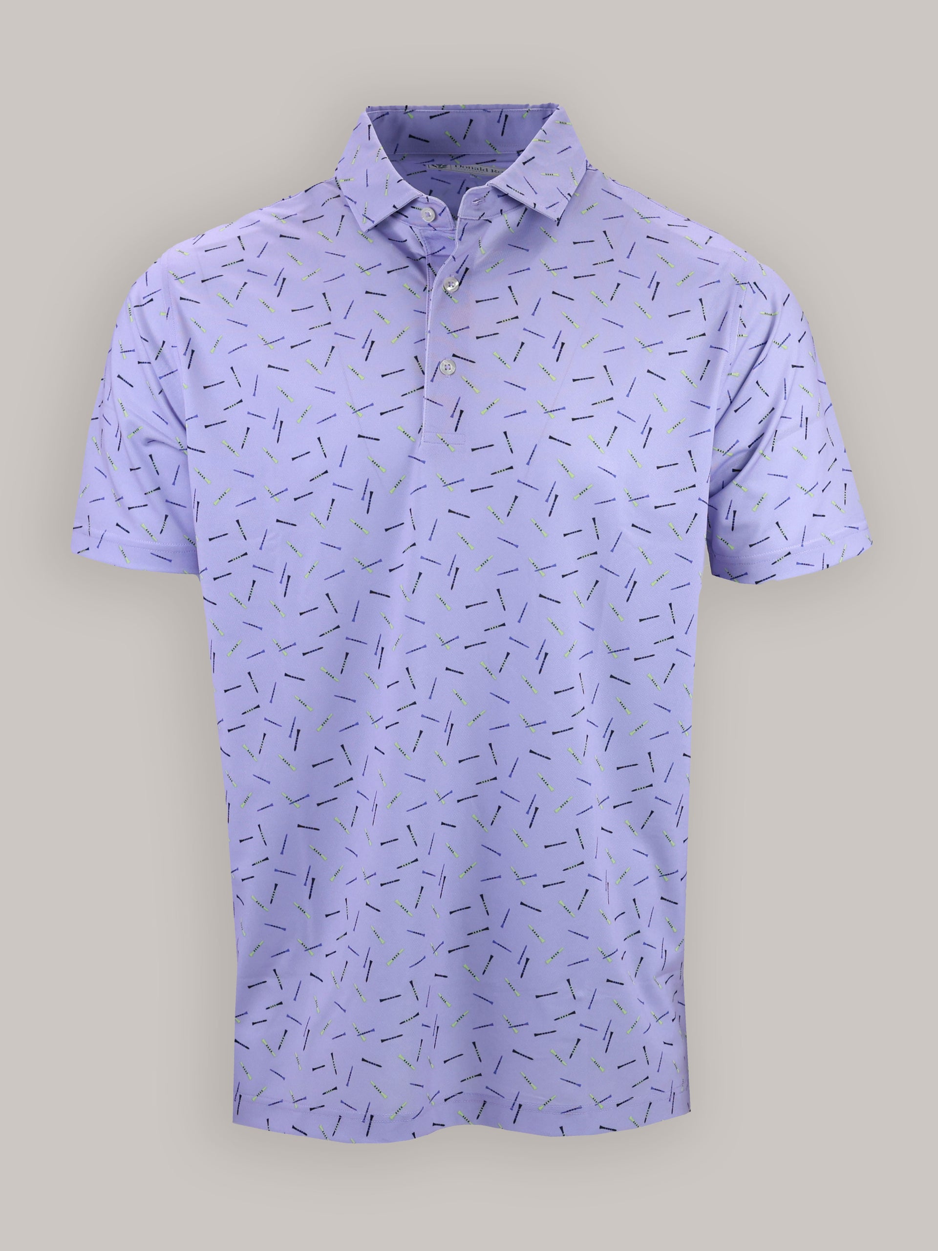 Lavender polo shirt with a scattered golf tee graphic pattern. The shirt features a classic collar and a button placket, conveying a playful, casual tone.