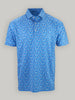 Blue short-sleeved polo shirt with a vibrant, swirling pattern in various squiggles in red white and blue. The shirt has a classic collar and button-up neckline.
