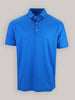 A vibrant blue, short-sleeved polo shirt with a small floral geometric pattern and three buttons, set against a neutral gray background.