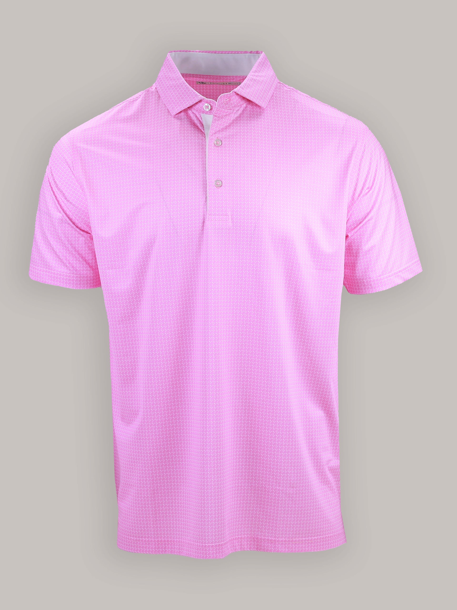 A pink short-sleeved polo shirt with a subtle textured pattern and a collar, displayed against a plain gray background. The shirt has a relaxed and casual feel.
