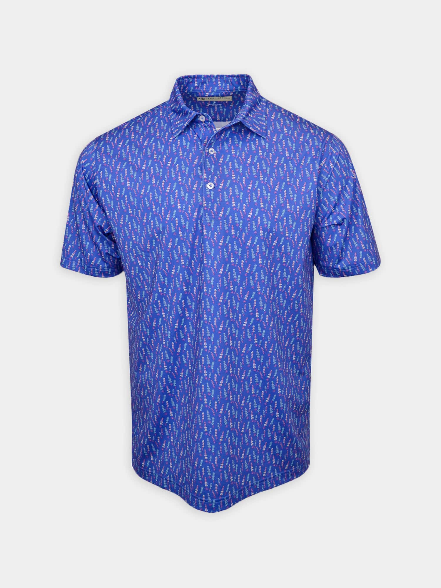 A blue short-sleeve polo shirt with a playful multicolored pattern of lavender. It has a collared neckline and three white buttons down the front.