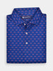 Blue polo shirt with a small red white and blue crossed flags, folded neatly. The collar is pointed, and three white buttons are visible.