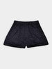 Black shorts with an elastic waistband and a subtle white golf tee pattern
