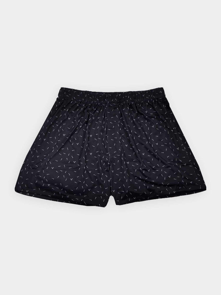 Black shorts with an elastic waistband and a subtle white golf tee pattern