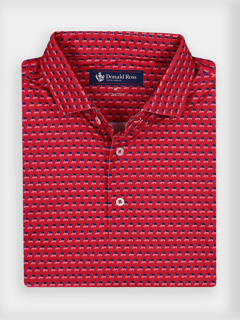 Red collared shirt with a playful red, white, and blue republican pattern, neatly folded. The label reads "Donald Ross" in white text on a navy background.
