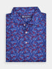Blue golf polo shirt with a vibrant abstract pattern of red and white ribbons
