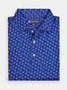 Blue polo shirt with a vibrant pattern of small red, white, and blue stars and stripes hats. The collar and button detail add a classic touch.