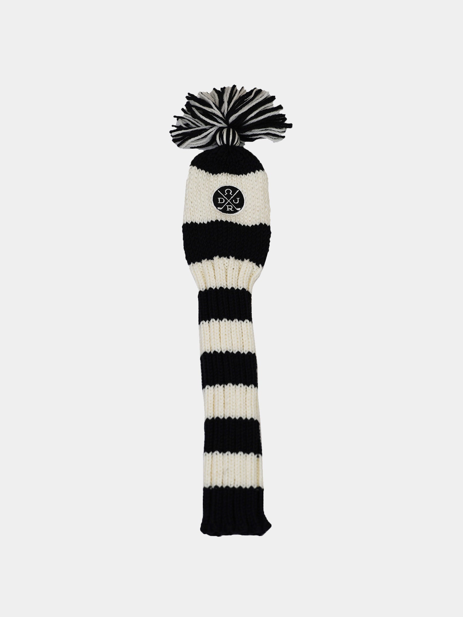 Black and white striped knit hat cover with a pom-pom on top. Features a logo patch at the front.