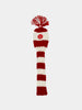 Red and white striped knit golf club headcover with a pom-pom on top and logo