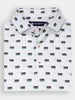 A white collared shirt is folded neatly and features a repeating pattern of small flags in various colors.