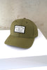 Olive green baseball cap with white woven patch reading "Donald J. Ross Assoc. 1872 Golf Course Design Architecture & Construction."