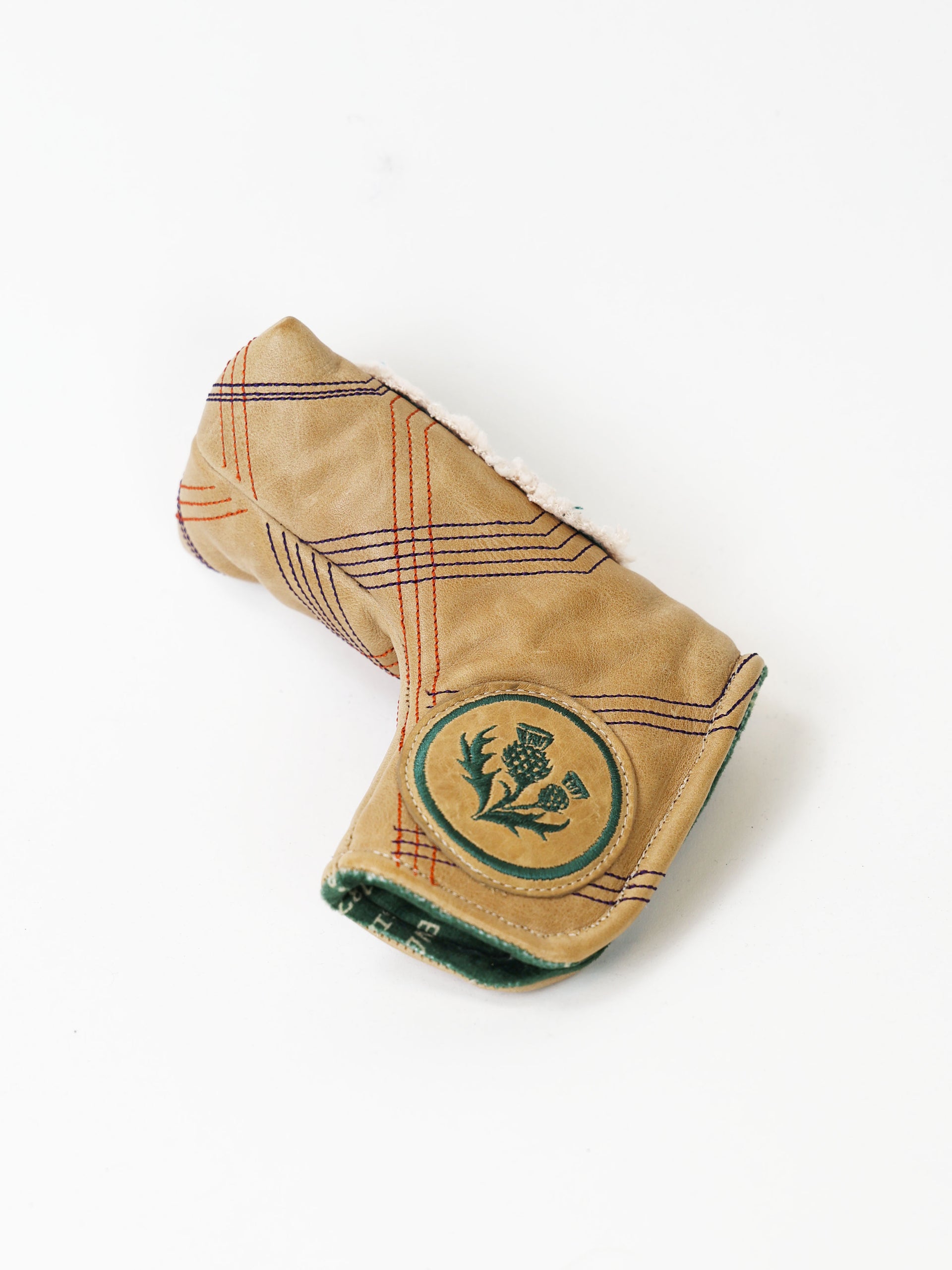 Donald Ross Clubmaker putter cover displayed on a putter, highlighting refined materials, tailored fit, and traditional golf craftsmanship.