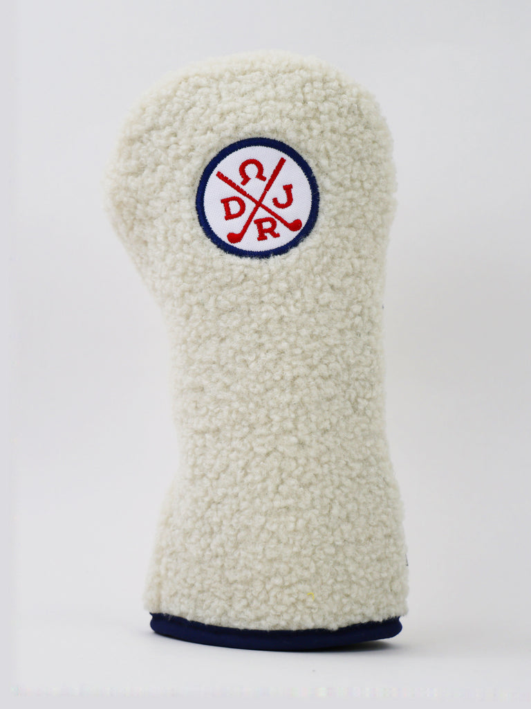 Cream-colored wool golf club head cover with embroidered Donald Ross Sportswear logo in red and navy.