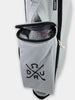 White golf bag organizer with mesh ventilation pocket and Donald Ross Sportswear logo displayed open to show interior storage compartments.