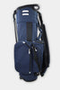 Navy blue golf stand bag with black accents, dual shoulder straps, and multiple pockets displayed against a white background.