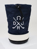 Navy drawstring bucket with white embroidered crossed golf clubs and horseshoe logo, featuring a white stripe and black base trim.