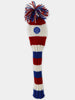 Red, white, and blue striped knit golf club head cover with a pompom top and embroidered crest.