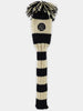 Black and cream striped knit golf club head cover with a pom-pom top and embroidered logo patch.
