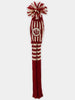 Red and cream knitted golf club cover with pom-pom top and embroidered crest badge.
