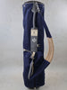 Navy canvas golf bag with tan accents and gray leather shoulder strap featuring MacKenzie and Donald Ross branding.