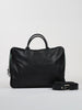 A sleek black leather briefcase with sturdy handle, front logo embossing, and a detachable shoulder strap, exudes a professional and elegant tone