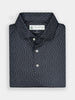 Short-sleeved, navy polo shirt with a patterned design, neatly folded and featuring a buttoned collar.
