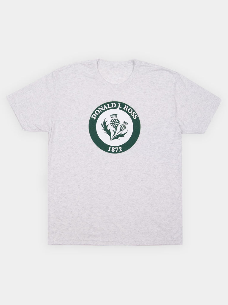 Light gray T-shirt featuring a green circular logo with text "Donald J. Ross 1872" and a stylized thistle design, conveying a vintage feel.