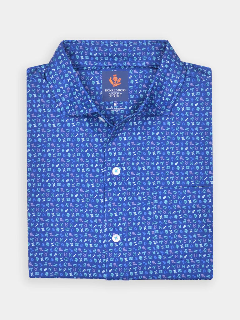 Folded blue shirt with a pattern of white zodiac symbols, featuring a neatly pointed collar and white buttons
