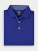 Folded royal blue polo shirt with contrasting patterned collar lining and three buttons