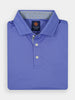 A neatly folded, vibrant blue polo shirt with a subtle textured finish