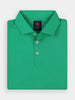 A folded green polo with a classic collar and three buttons, made from breathable pique fabric for comfort and flexibility