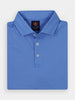 A folded blue polo with a classic collar, three buttons, and breathable pique fabric for comfort and flexibility on and off the course