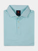 Teal golf polo shirt neatly folded, featuring a classic collar and three-button placket