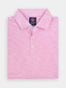 Folded pink and white striped golf polo shirt with a label inside the collar