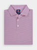 Folded striped polo shirt in white, navy, and red hues. Featuring a collar, three buttons, and stretchy performance fabric