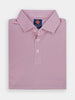 Folded pink golf polo with blue and orange stripes, featuring a collar and buttons