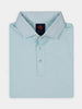 Folded light blue polo shirt with a collar and three buttons, featuring a label inside the collar