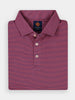 Folded red striped polo shirt with a neatly arranged collar and buttons, featuring performance moisture-wicking fabric