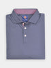 Folded blue golf polo shirt with white buttons and red stitching, featuring a striped red inner collar