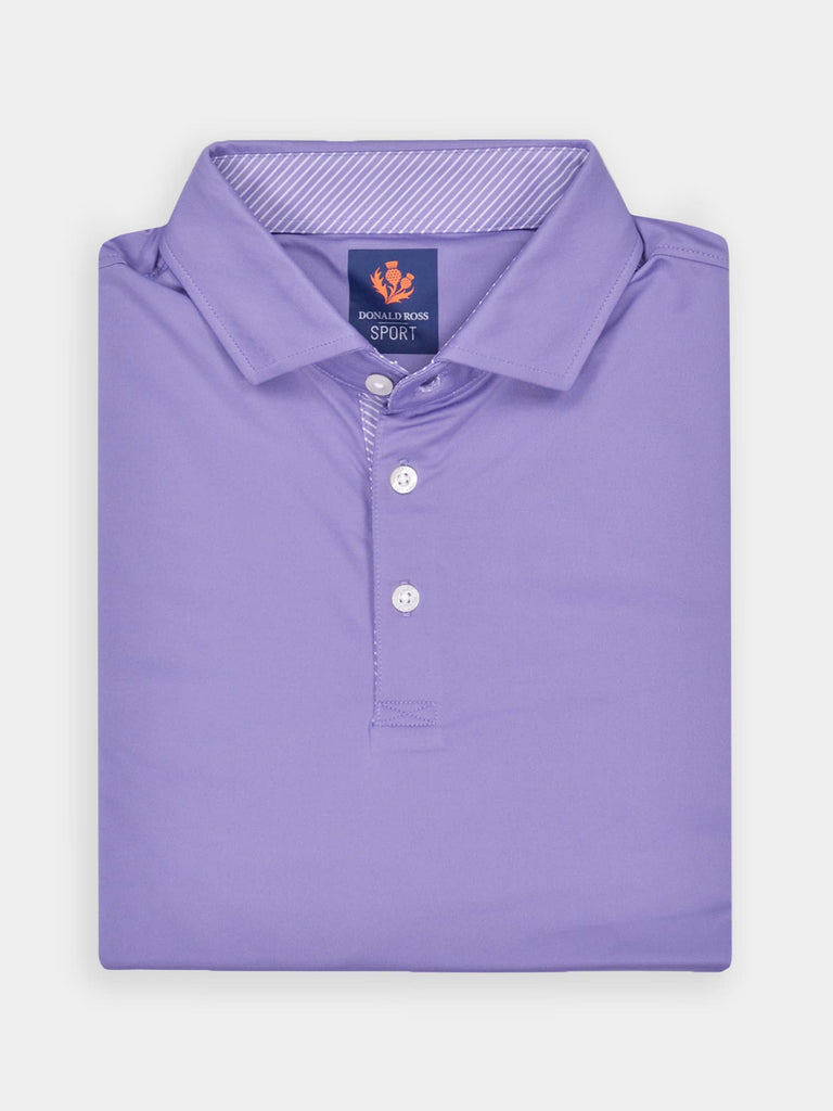 Folded lilac polo golf shirt with a pointed collar and three white buttons