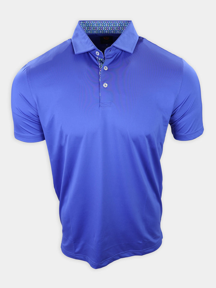 A blue polo shirt with a collar and a patterned interior is displayed against a plain background.