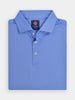 Light blue golf polo shirt folded neatly with a collar and three white buttons