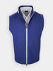 A blue sleeveless vest is displayed with a white collared shirt partially visible underneath.
