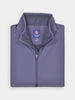 Folded purple performance golf vest from Donald Ross with adjustable front zipper on a white background