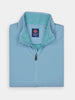 Light blue vest with a high collar and dark zippered front. Inside collar is teal fabric lining