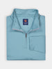 A folded light blue pullover with a quarter-zip is displayed against a white background