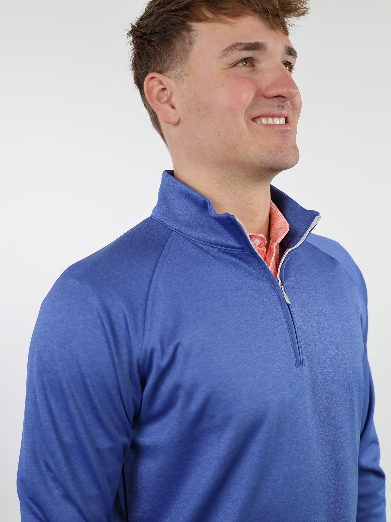 Front view of the Elias navy blue quarter-zip pullover featuring a lightweight performance construction and mock collar.