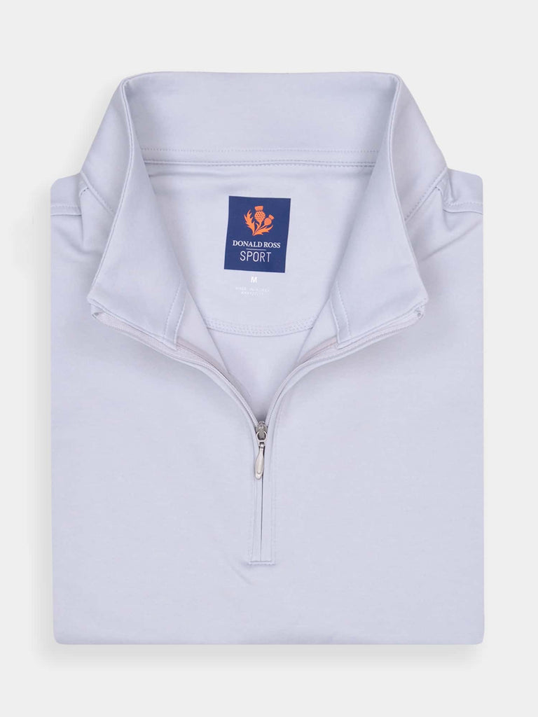 Folded light gray zip-up golf pullover vest with a standing collar
