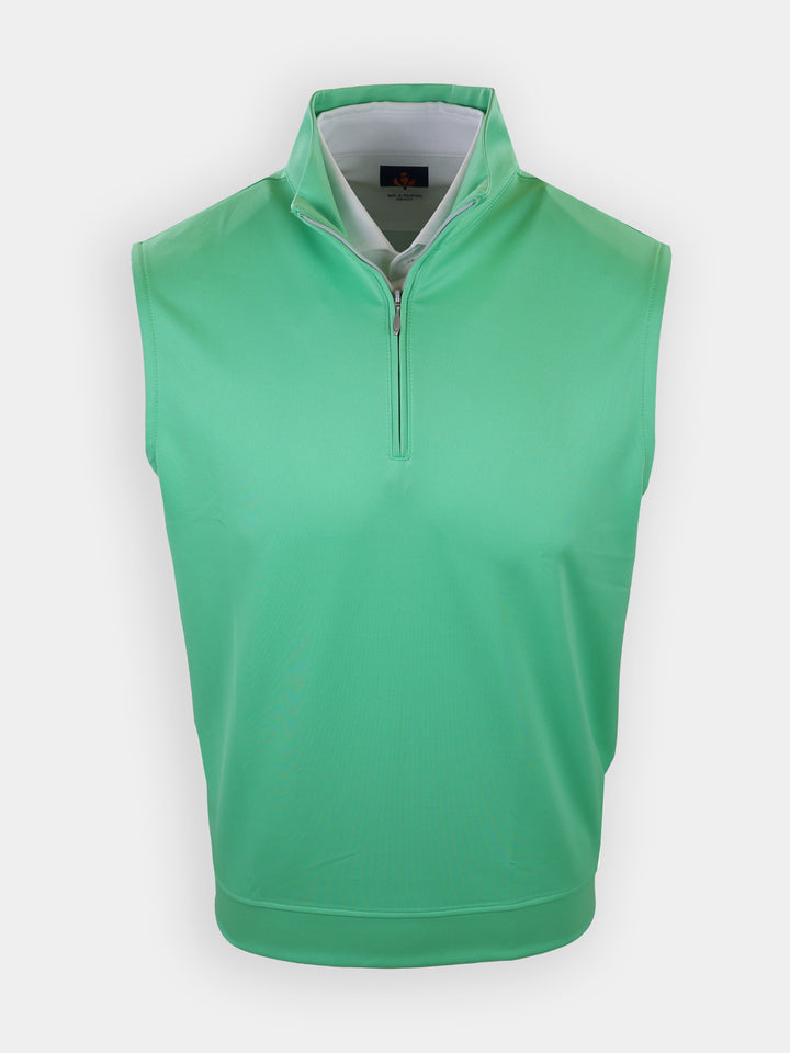Sleeveless light green pullover with a high collar and zipper in the front.